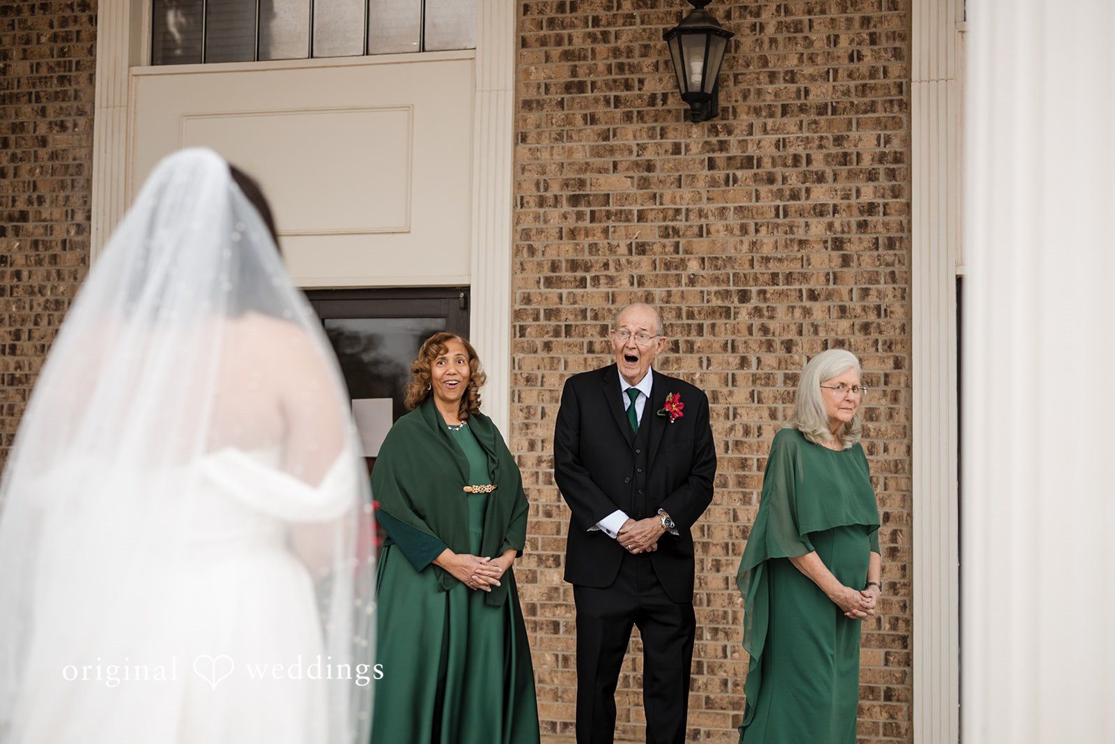 The bride's family shows surprise on seeing the bride