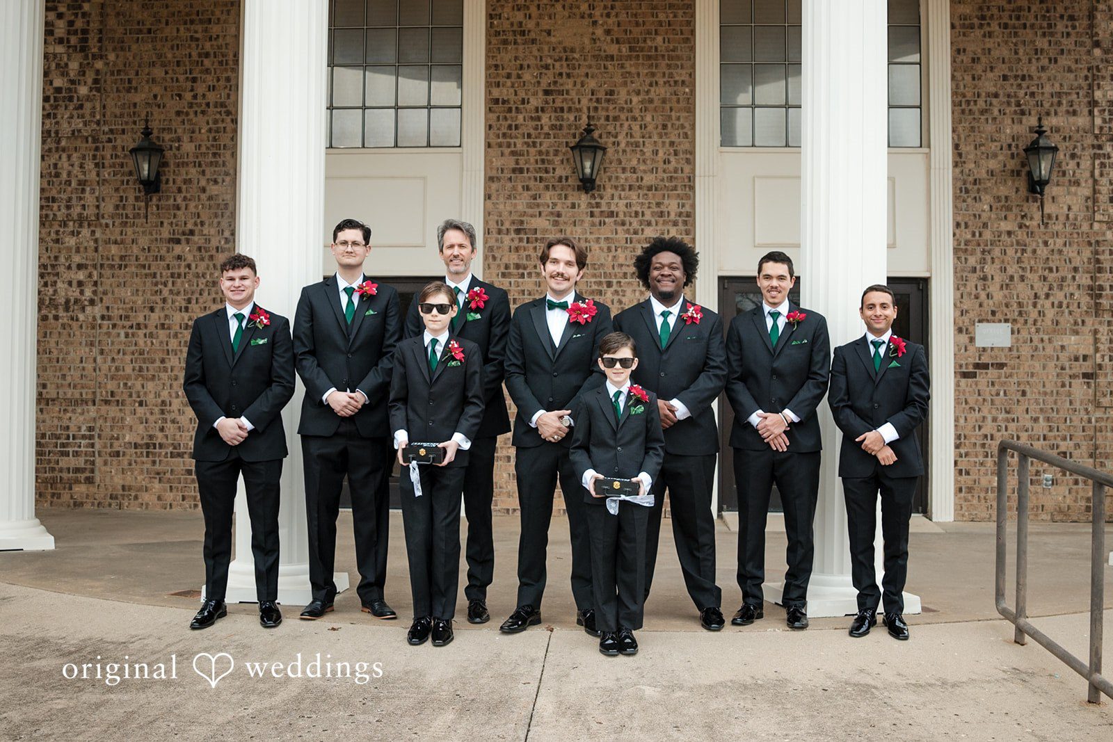 A stunning portrait of the groom and his groomsmen at the Keller Church of Christ