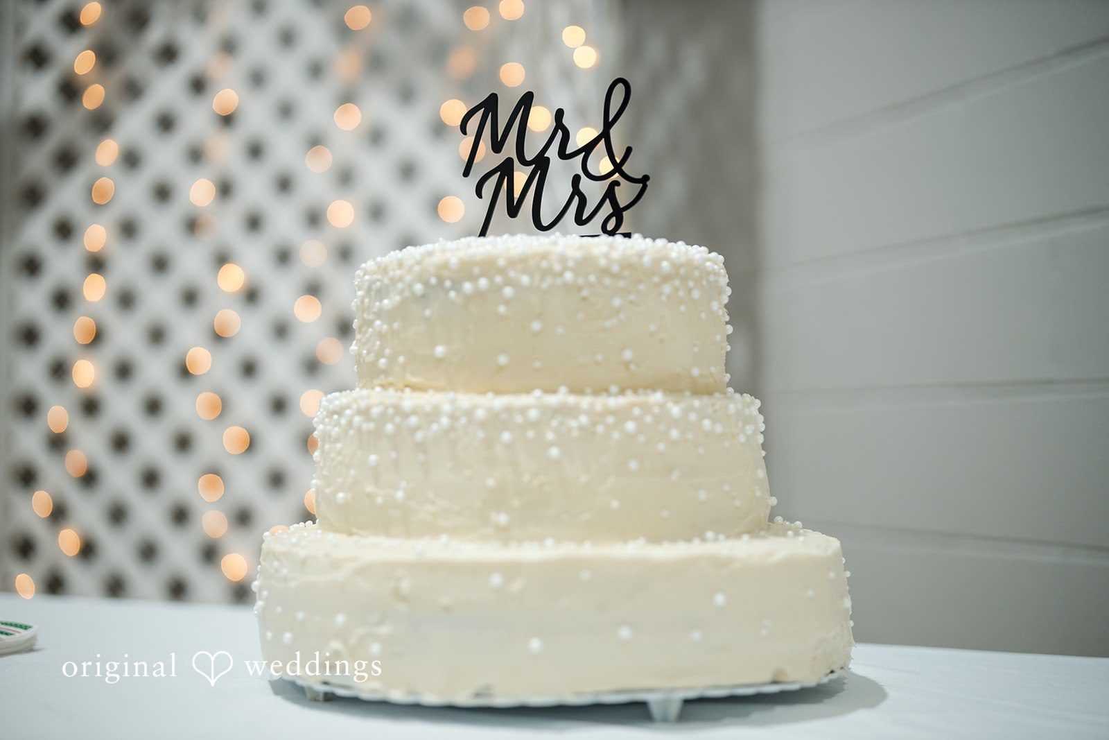 An all-white wedding cake