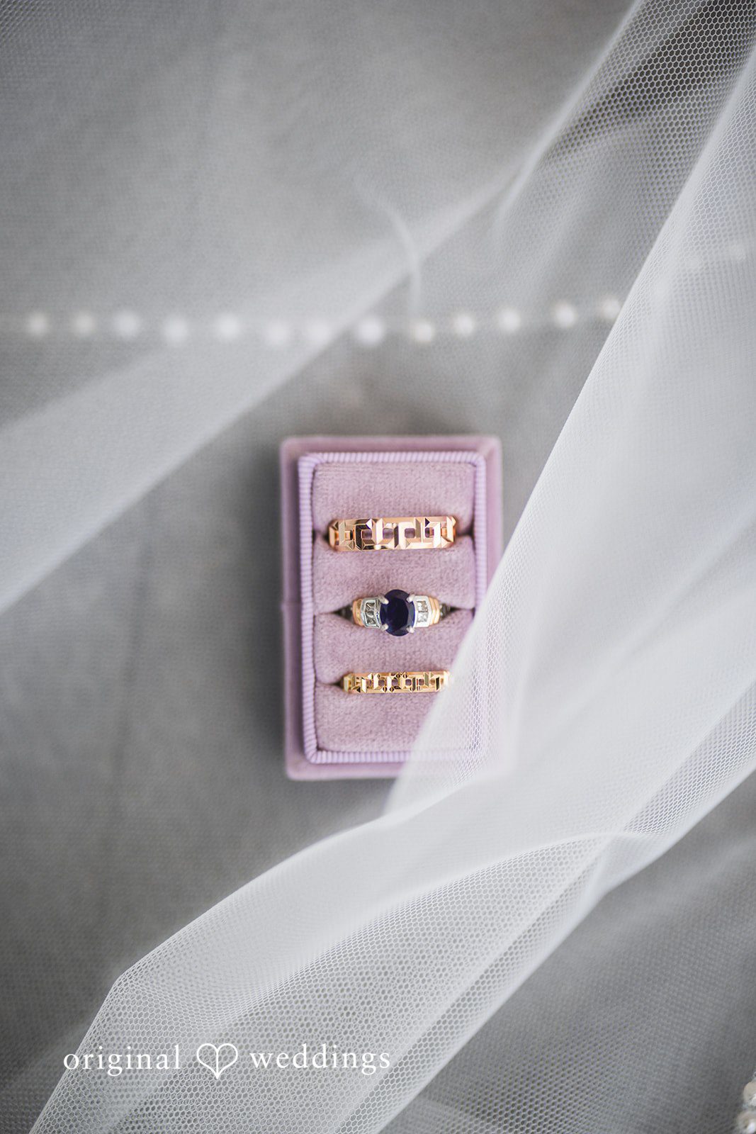 Nicolas + Nicole Close-up detail of the couple’s wedding rings