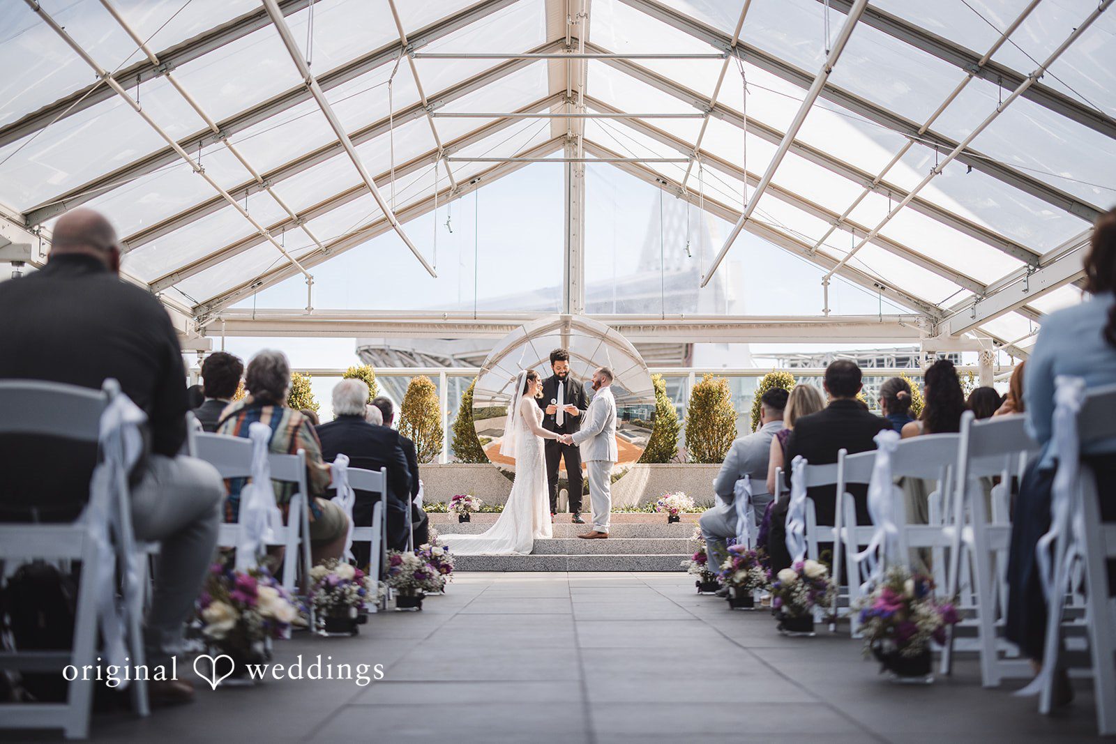 Nicolas + Nicole Bride looking toward the groom during the ceremony vows