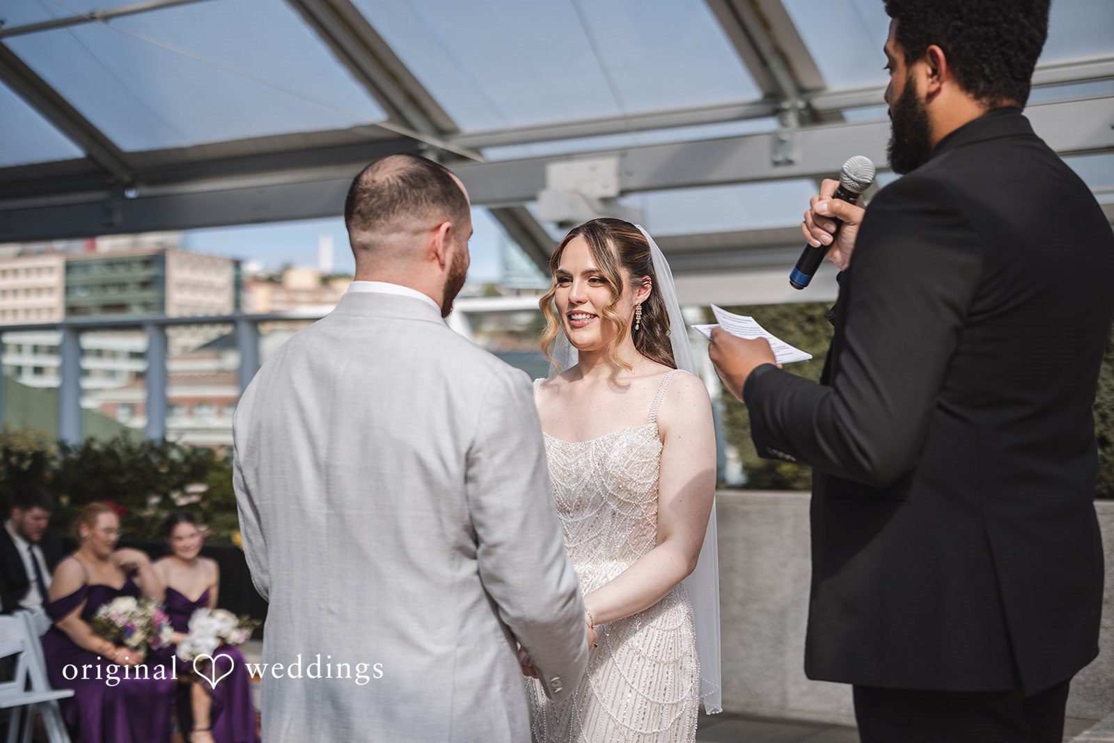 Nicolas + Nicole Couple sharing vows during the wedding ceremony