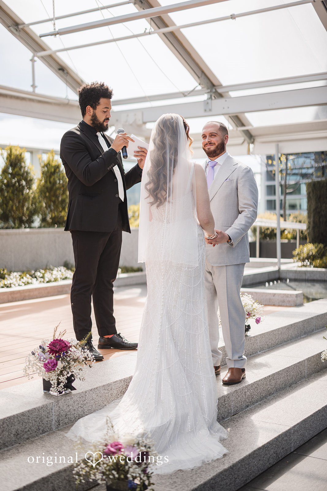Nicolas + Nicole Groom looking toward the bride while exchanging vows