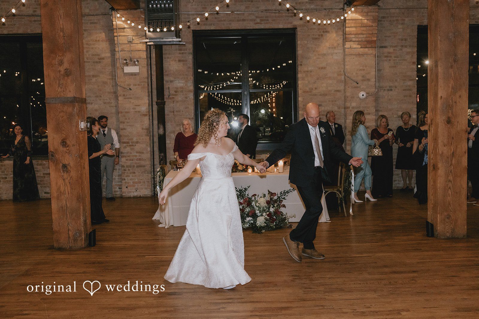 The bride dances with her father
