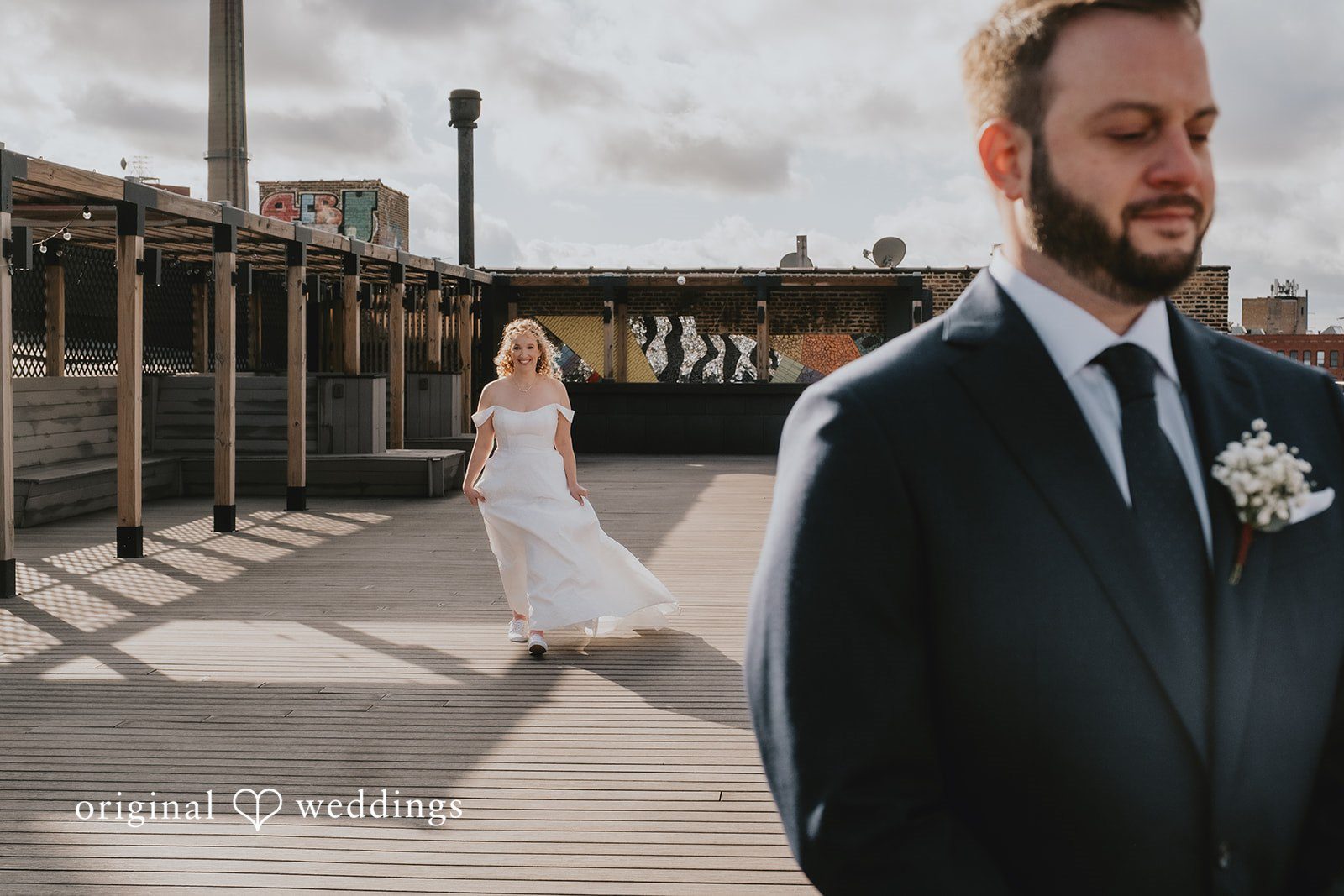A portrait of the bride about to unveil herself to the groom
