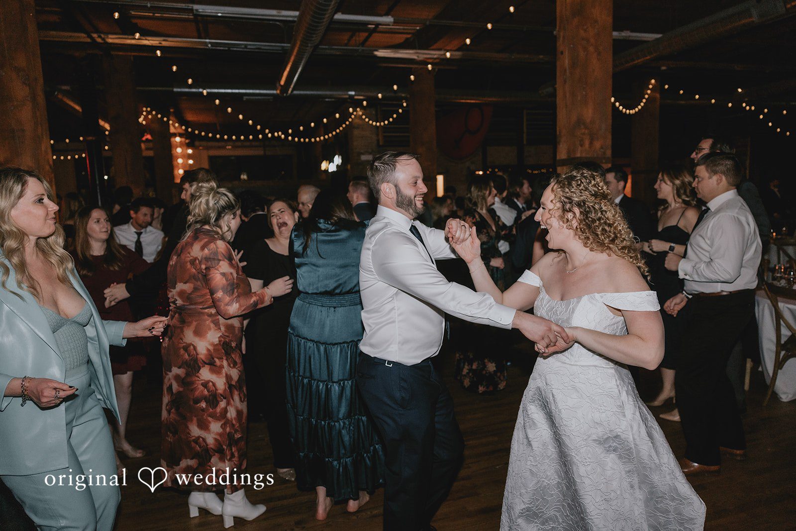 Couple dances with guests