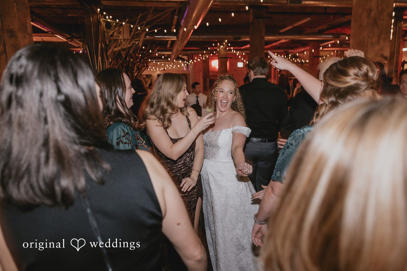A joyful bride and her wedding party