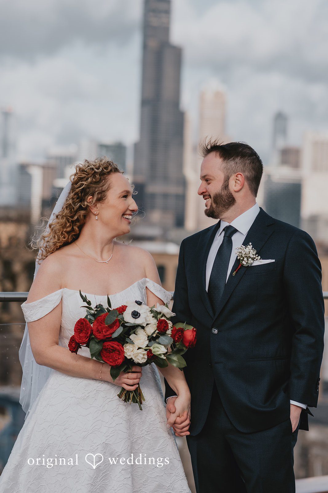 A joyful portrait of the couple at Lacuna Lofts