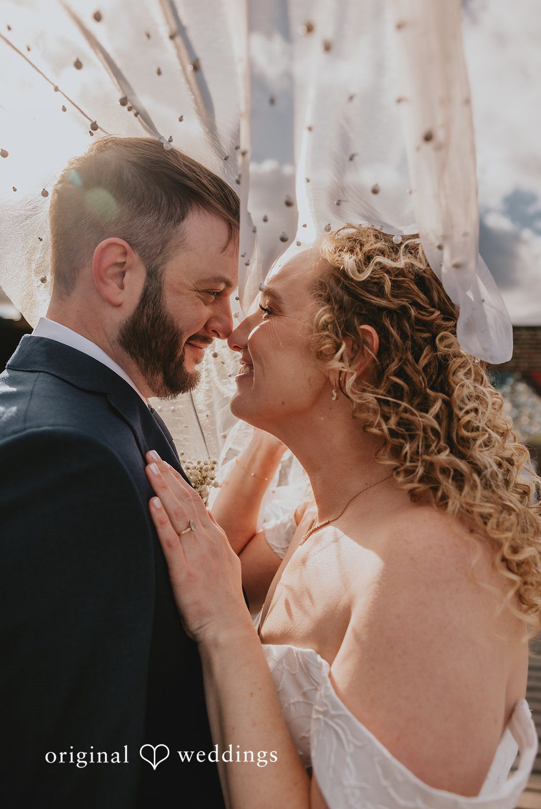 The couple having a romantic moment