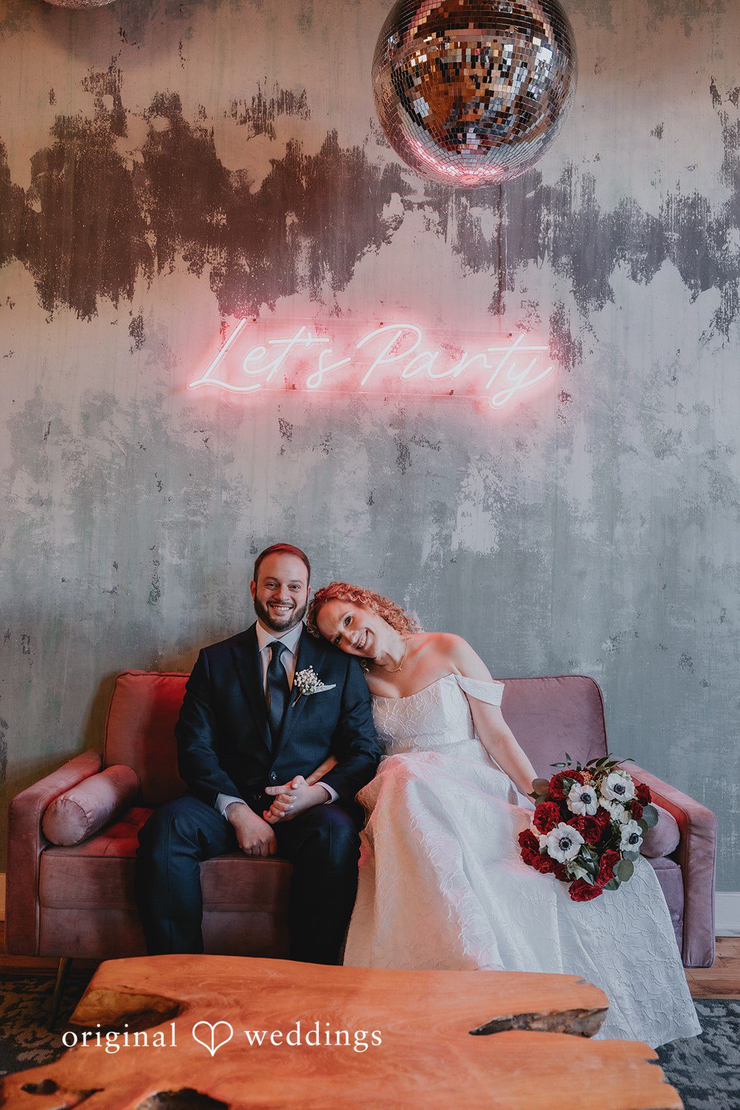 A gorgeous seated portrait of the couple