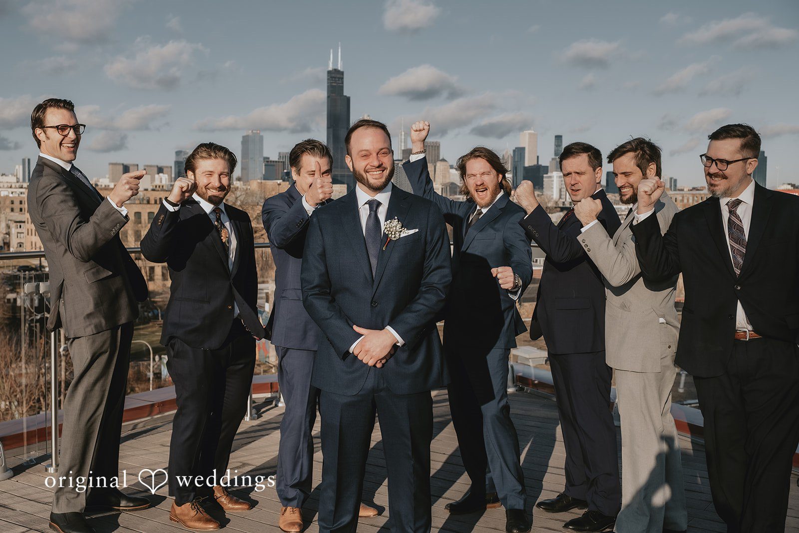 The groom and his joyful groomsmen before the wedding ceremony