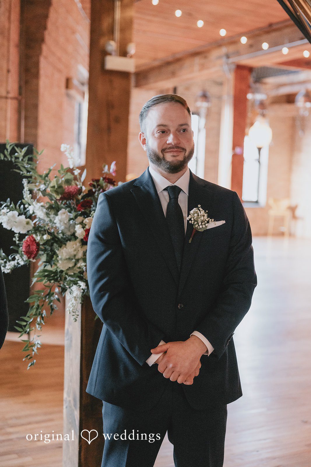 The groom anticipates the bride’s entrance