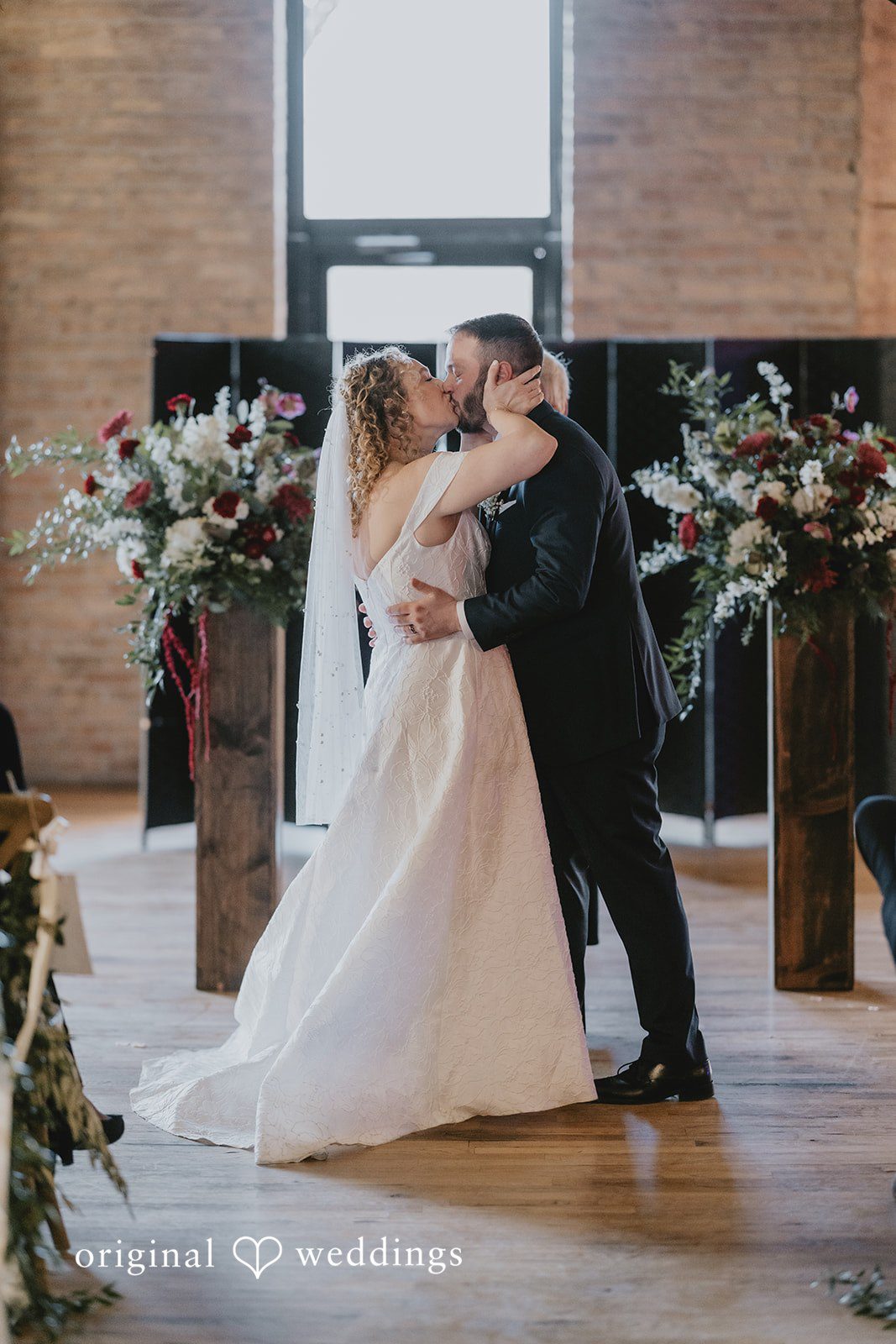 The couple takes their first kiss