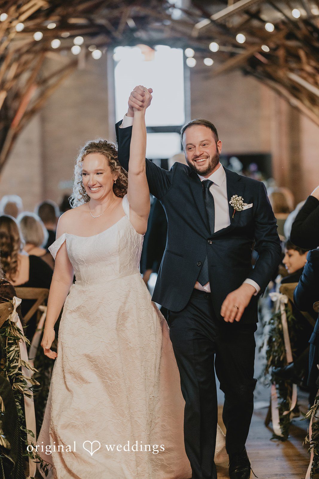 The couple makes a joyful exit