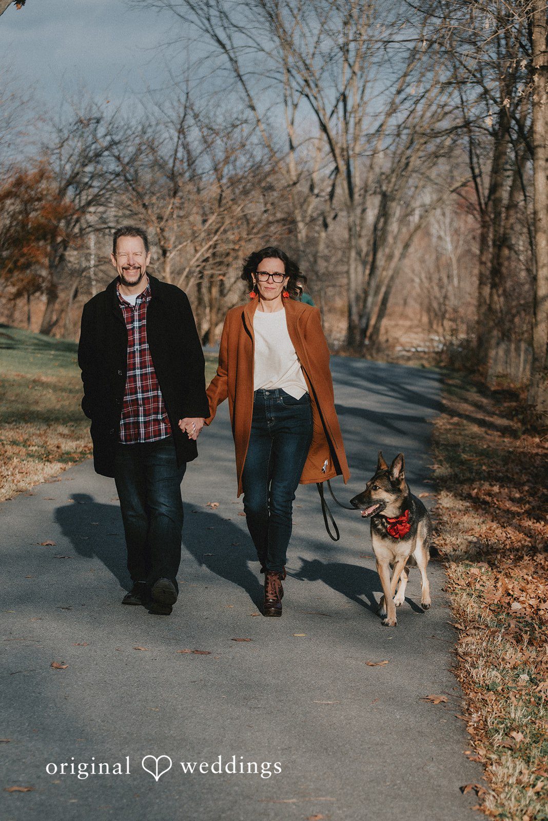 Our Baltimore engagement photographer captured the couple taking a walk with their pup at Lake Kittamaqundi