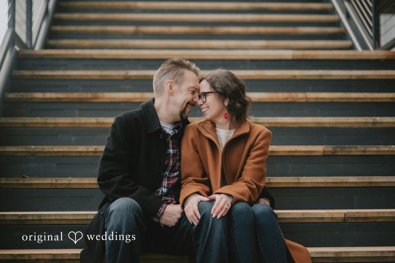 Our Baltimore engagement photographer captured a romantic portrait of the couple by the stairs at Lake Kittamaqundi