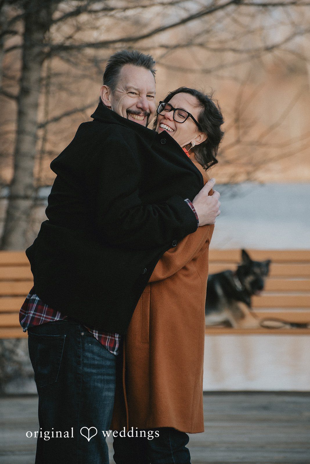 A happy portrait of the couple at Lake Kittamaqundi