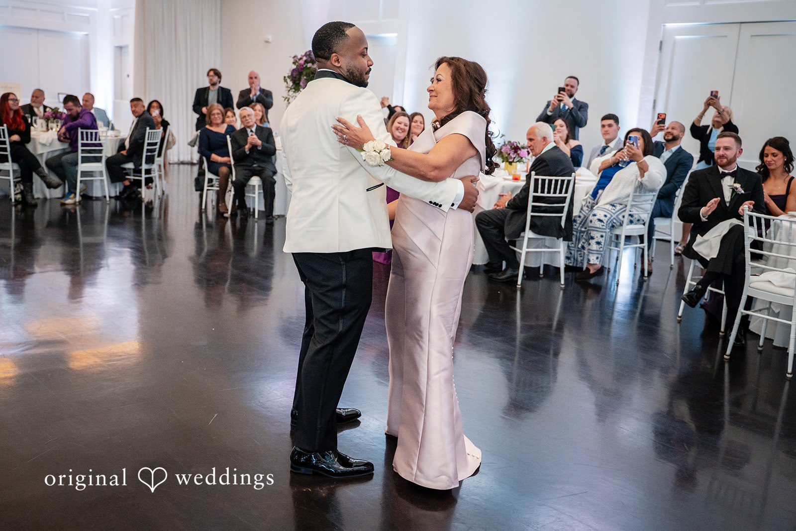 Groom dancing with his mother during the wedding reception
