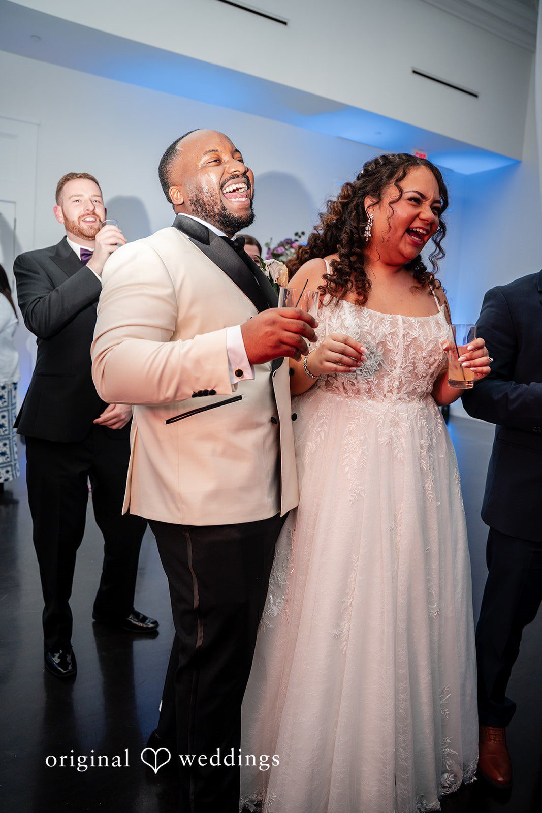 Couple enjoying a joyful moment during the reception
