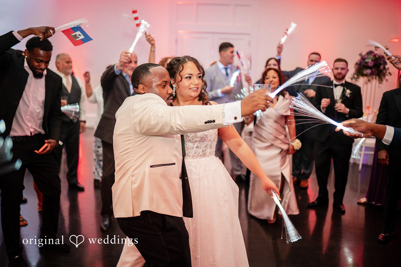 Guests and couples celebrating and enjoying the wedding reception together