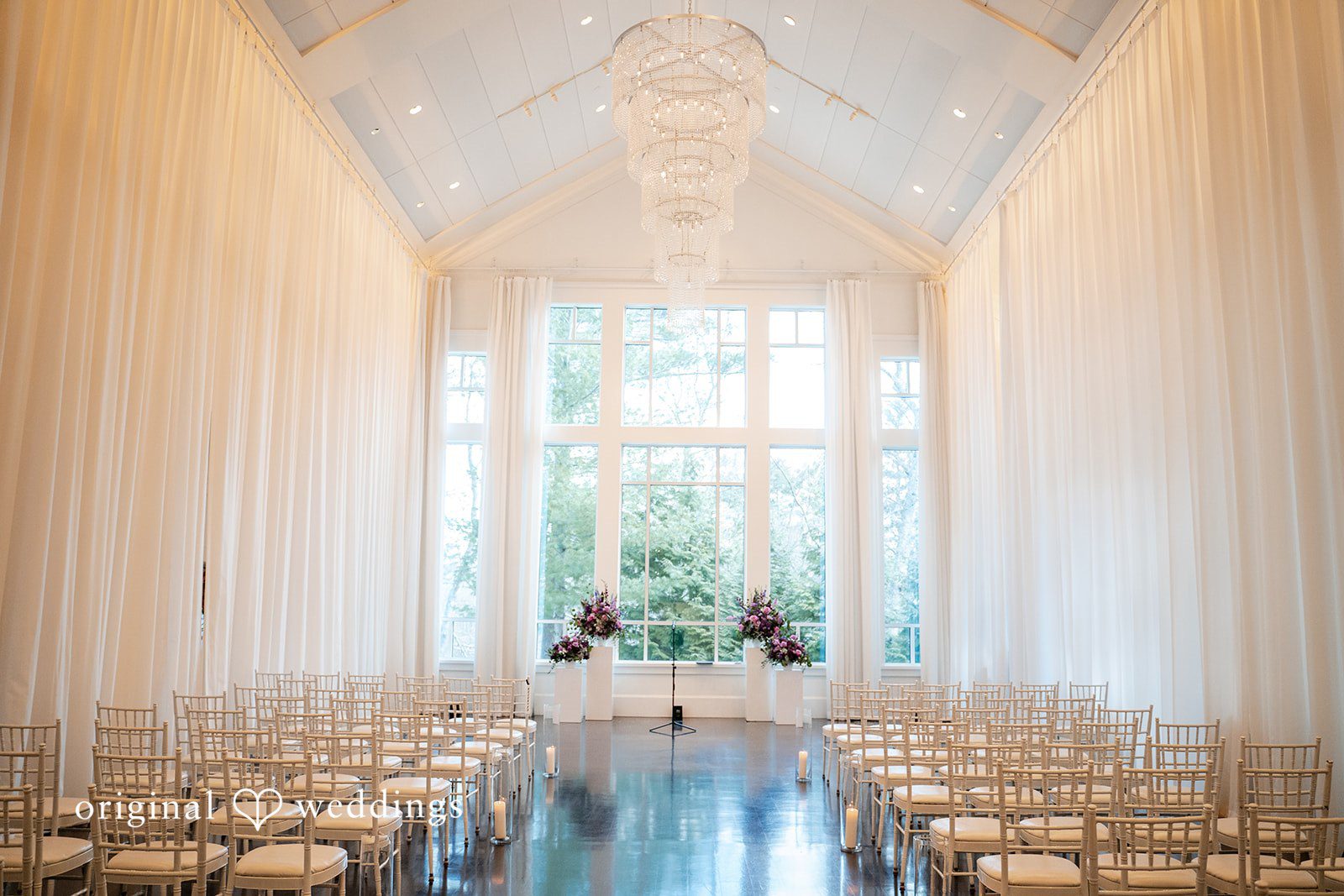 Indoor wedding ceremony setup at Lakeview Pavilion with elegant decor