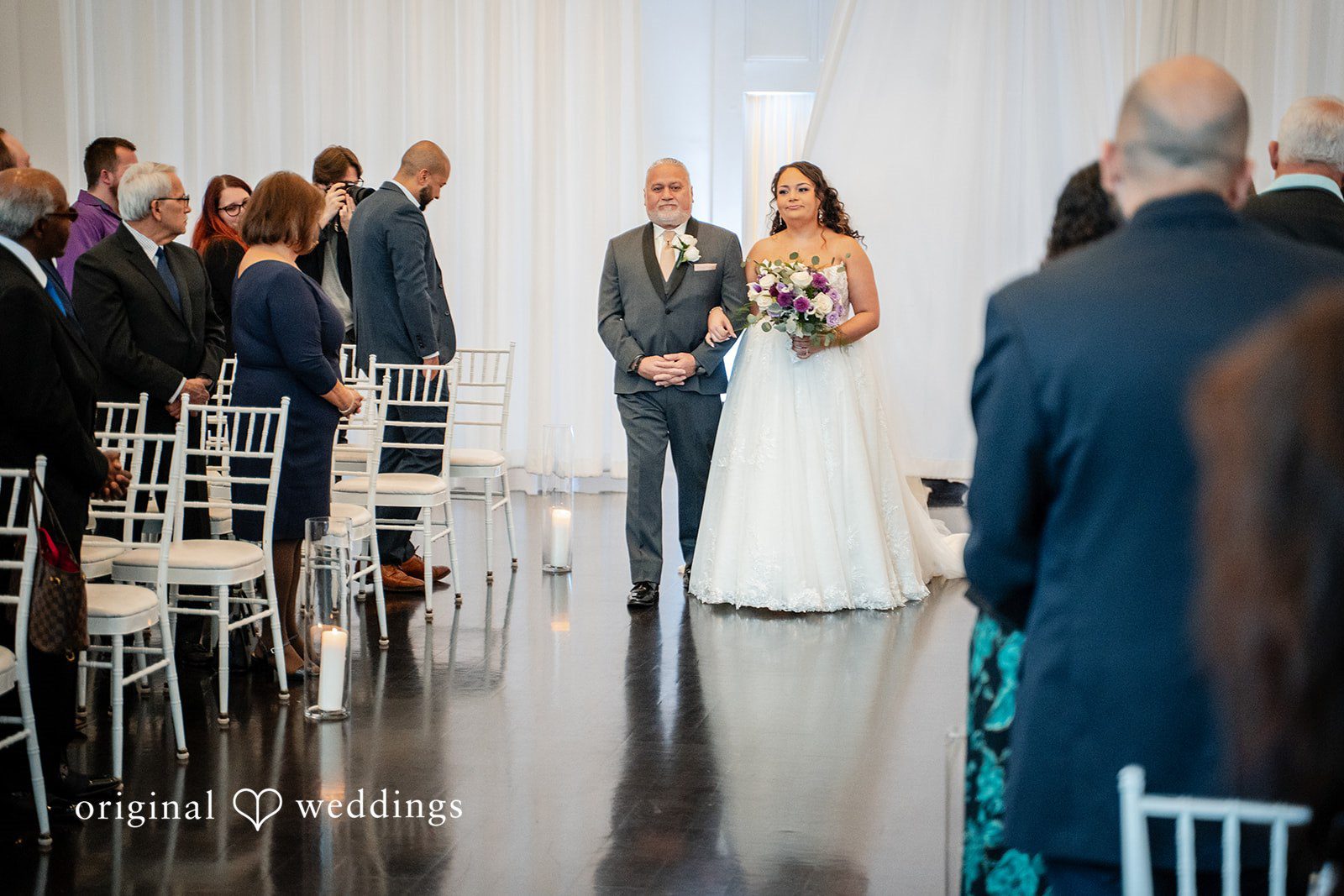 Bride walking down the aisle with her father