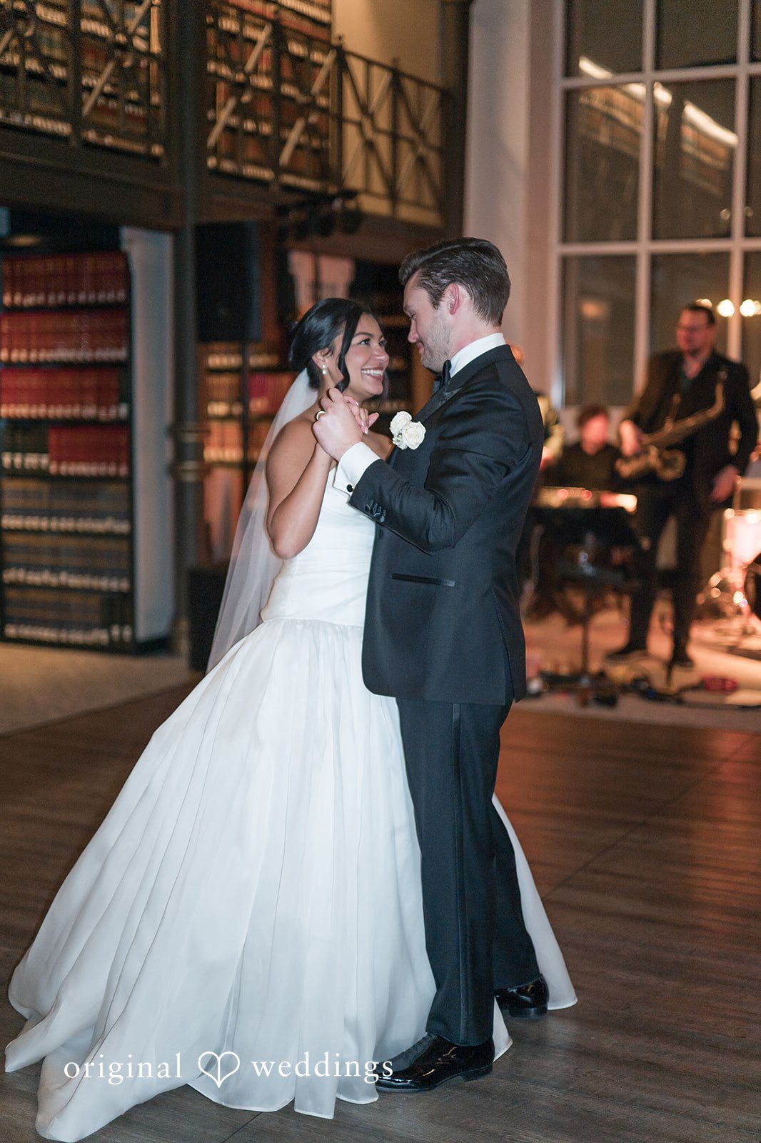 A Couple sharing their first dance together on the dance floor
