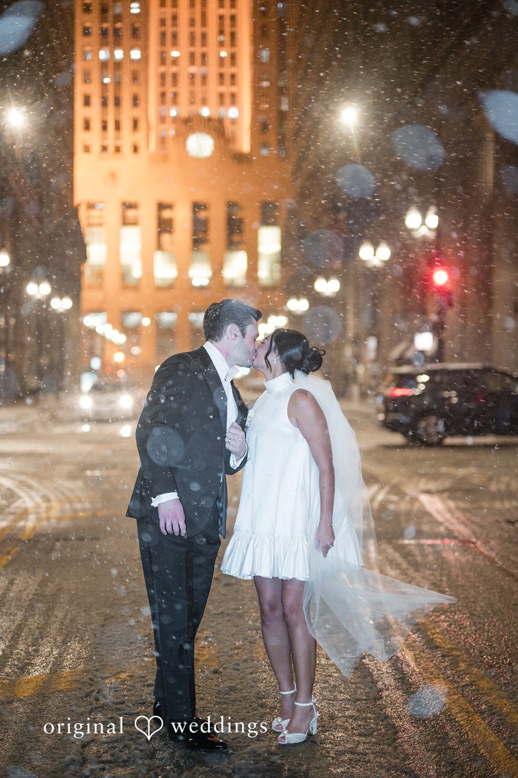 A couple kissing each other at Library at 190.