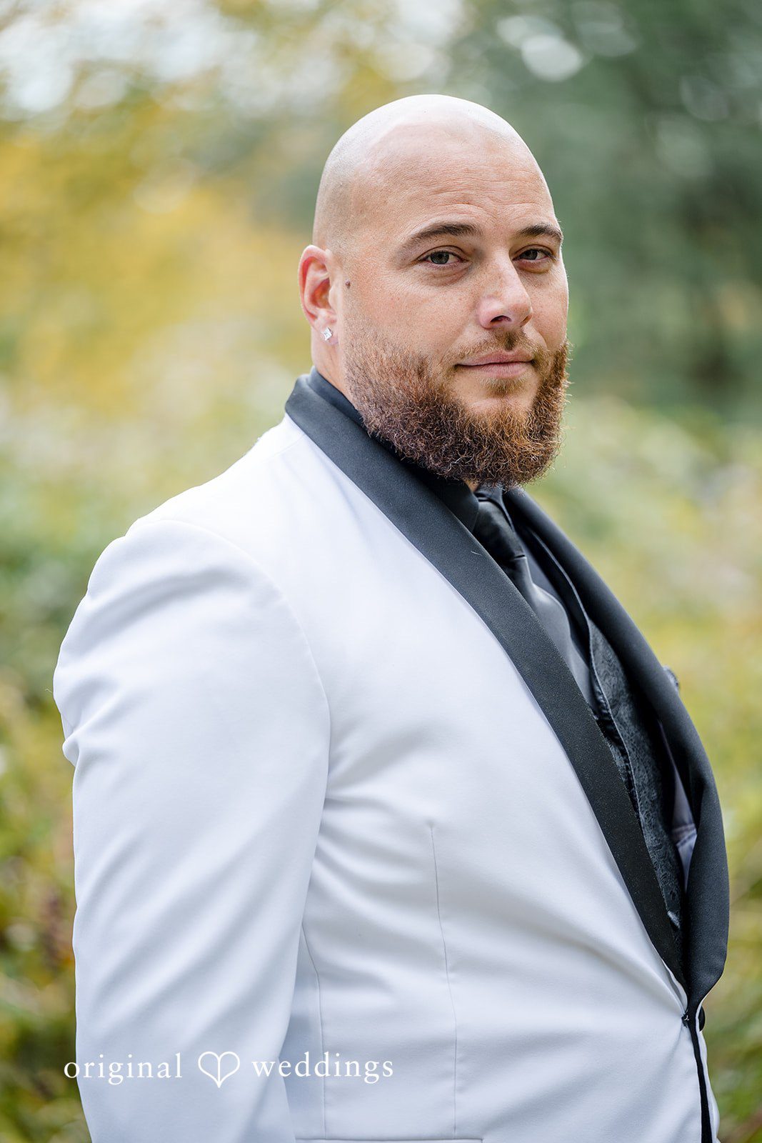 April + Joseph Stylish groom portrait at Lochwood Manor