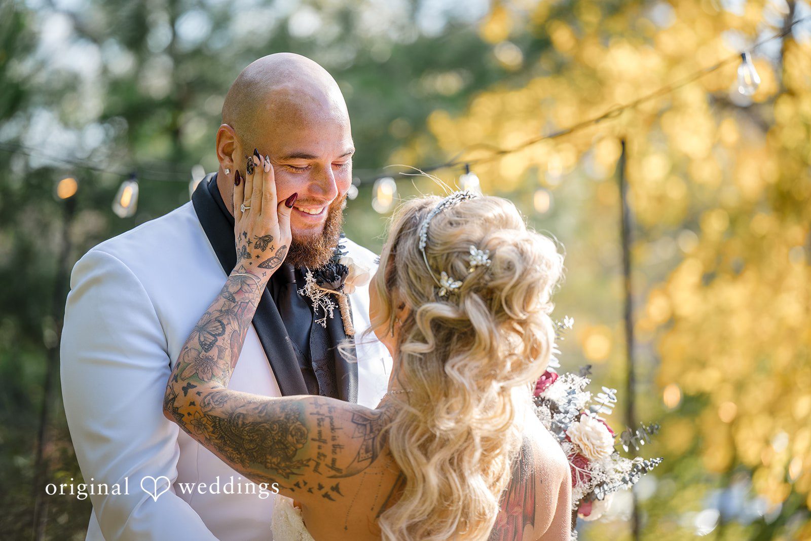 April + Joseph Bride touching groom’s face after ceremony