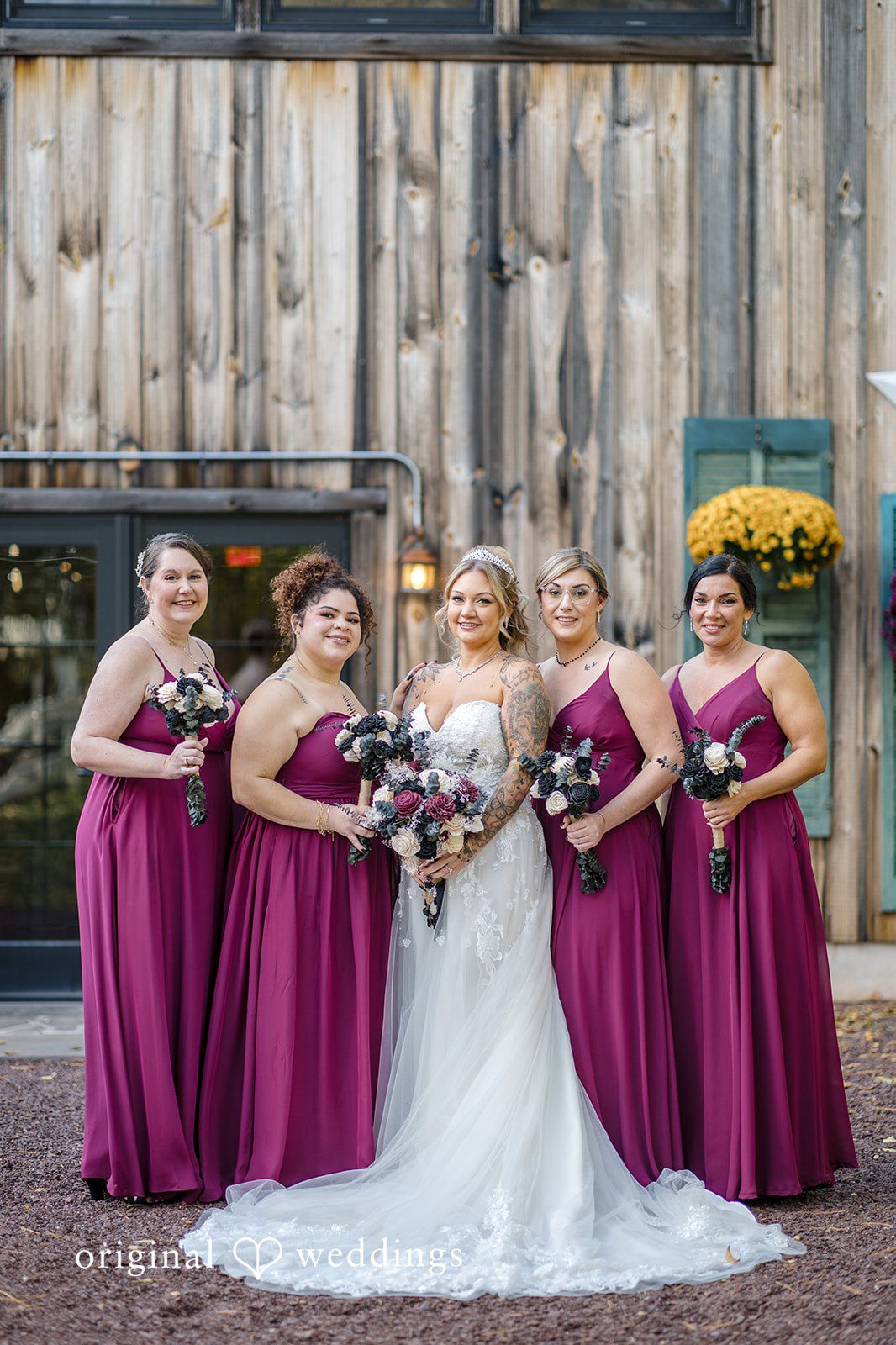 April + Joseph Bride with bridesmaids sharing joyful moments