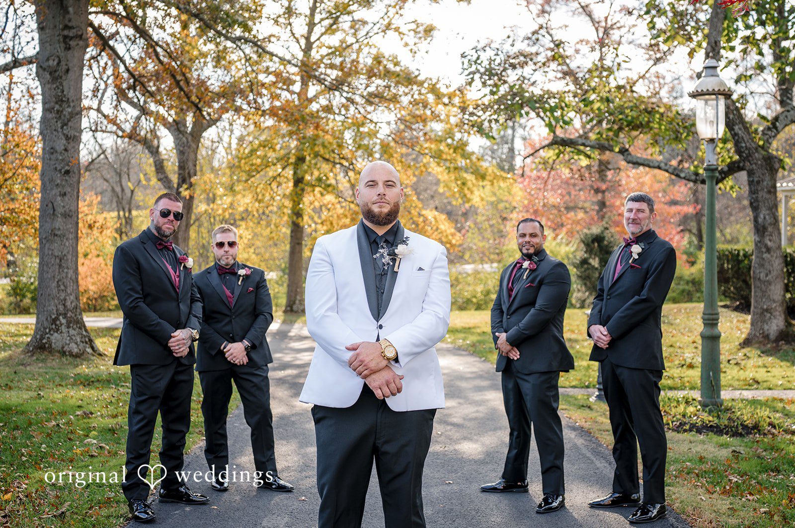 April + Joseph Groom with Groomsmen posing together