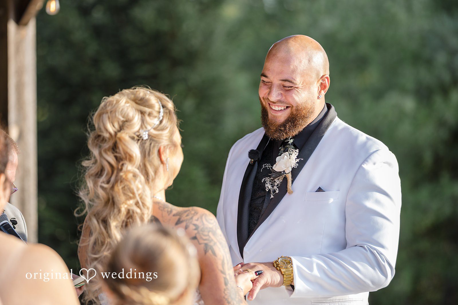 April + Joseph Groom smiling during wedding ceremony at Lochwood Manor