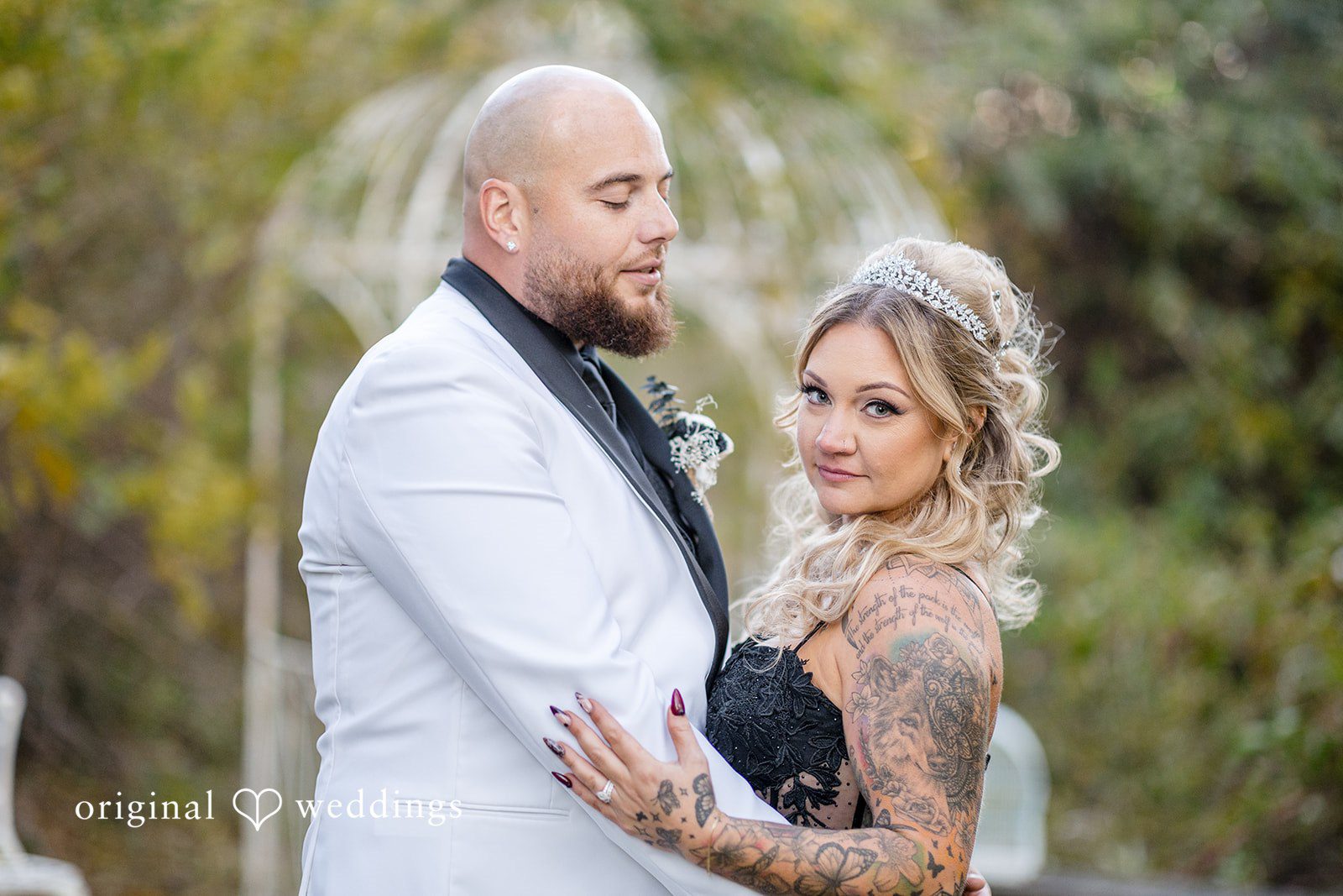 April + Joseph Elegant newlywed couple posing together outdoors after ceremony