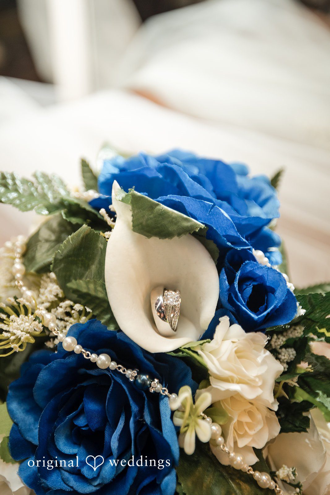 A beautiful and detailed shot of wedding ring placed in flowers