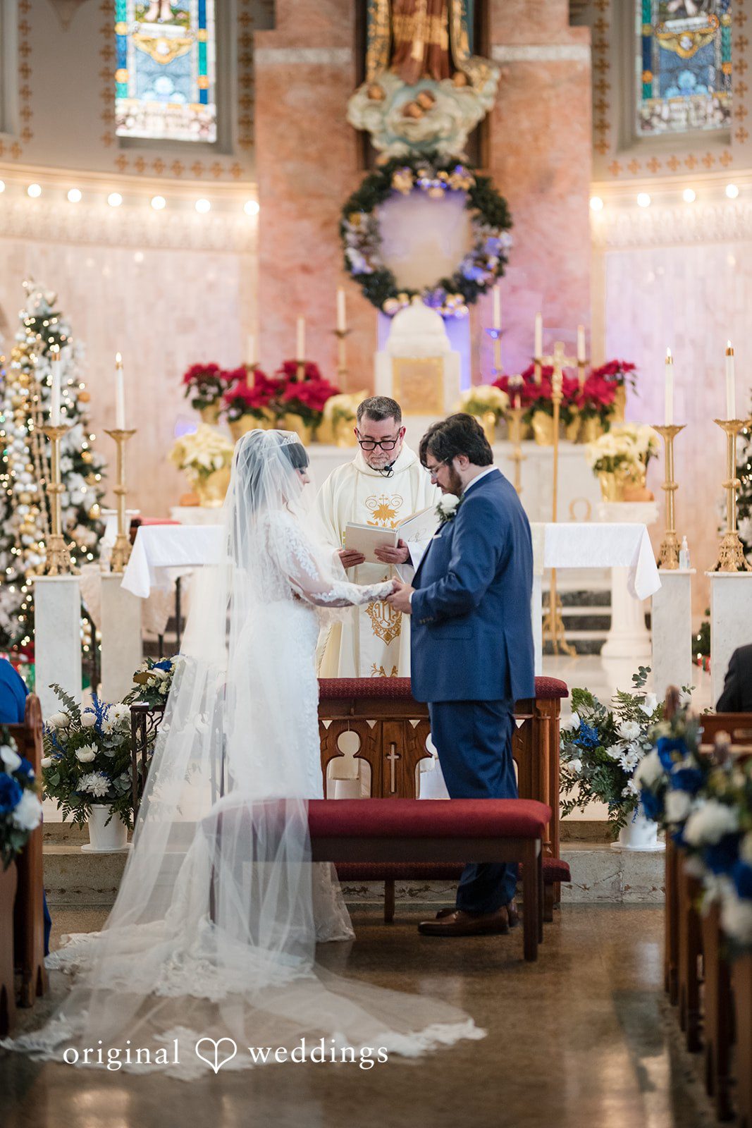 Couple exchanging rings during wedding ceremony