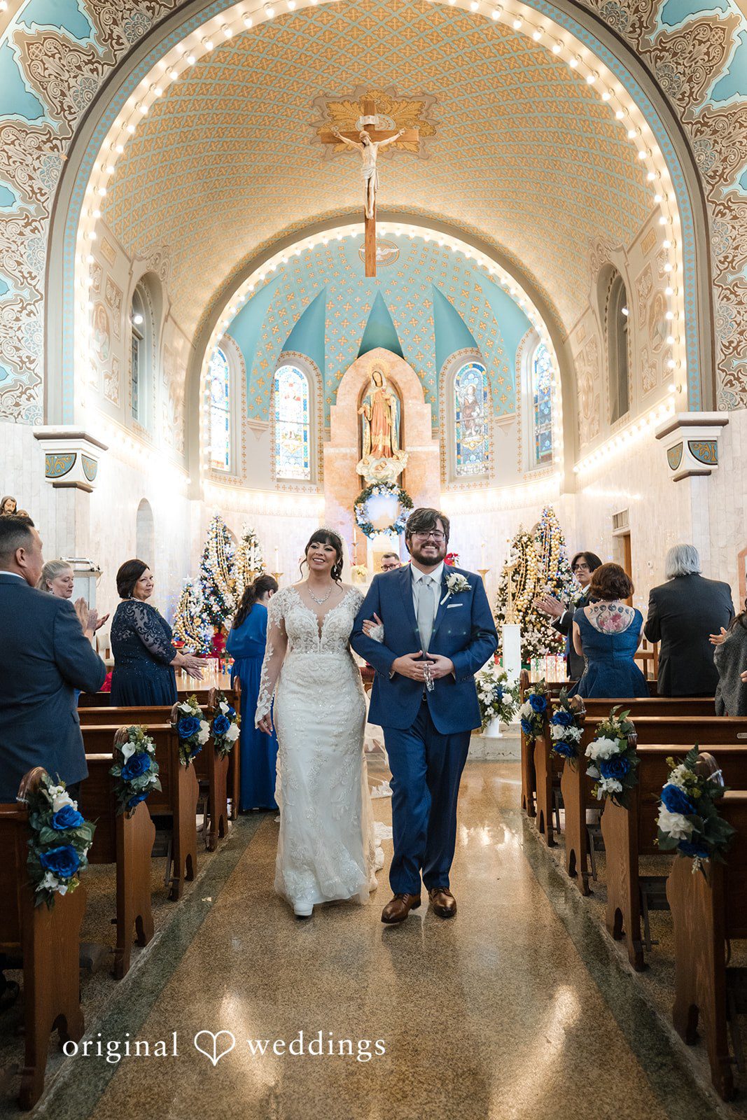 Bride and groom leaving the altar happily
