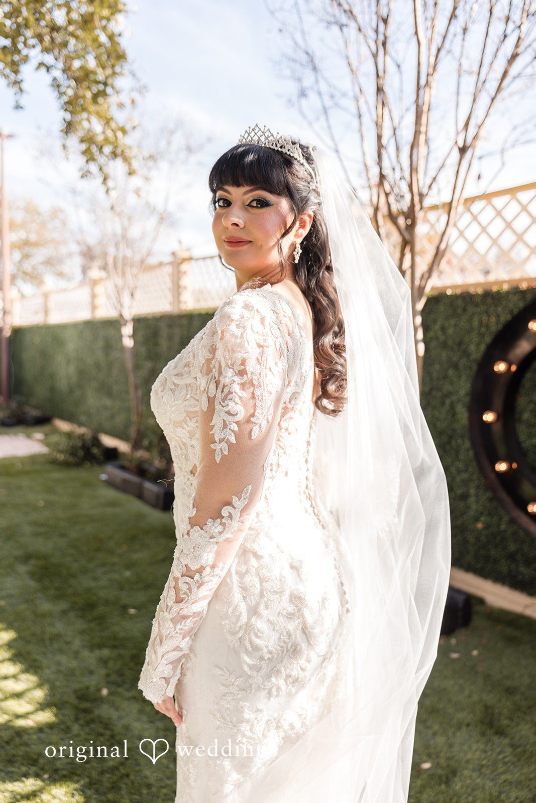 Stunning portrait of bride in her wedding gown at Magnolia Gardens on Main