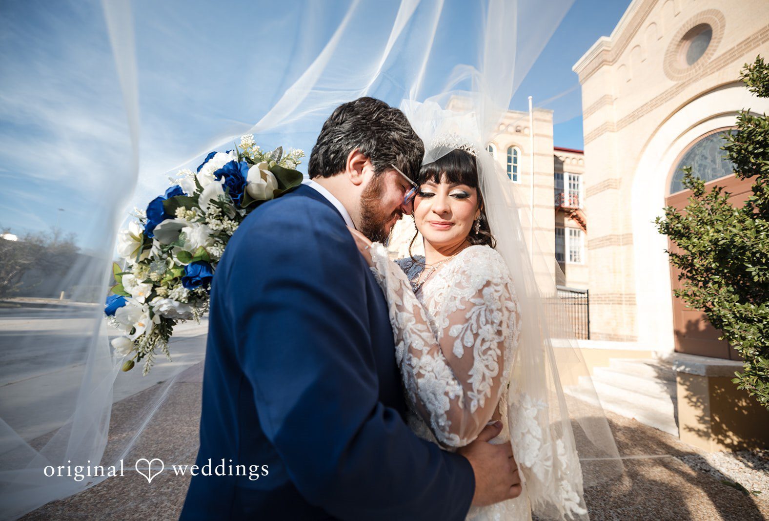 San Antonio wedding photographers from Original Weddings capturing the loveliest moment of couple at Magnolia Gardens on Main
