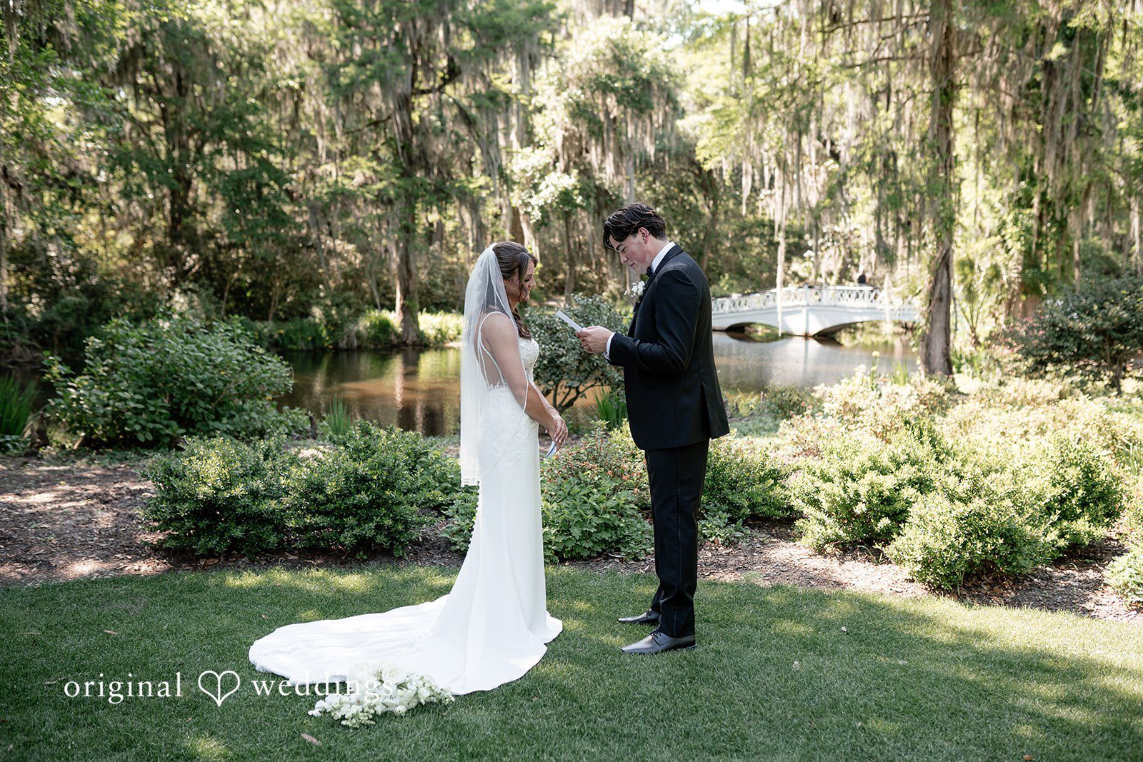 The groom reads his vows to the bride