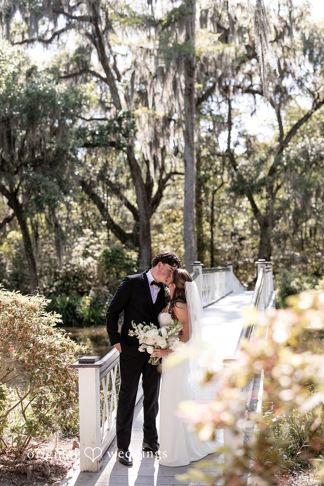 The couple shares a romantic kiss