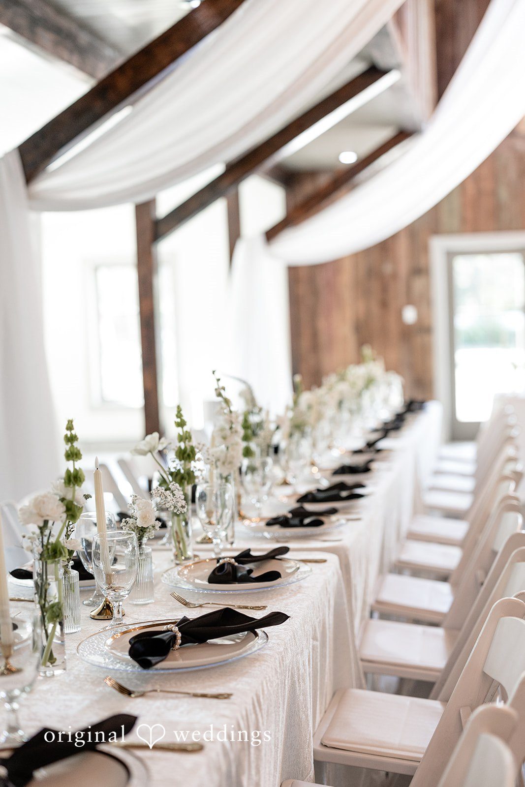 Beautifully decorated tables at the wedding reception hall
