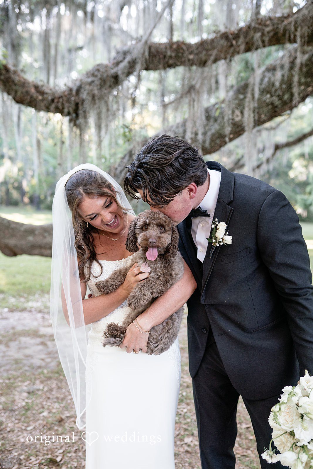 The couple and their pup share a lovely moment