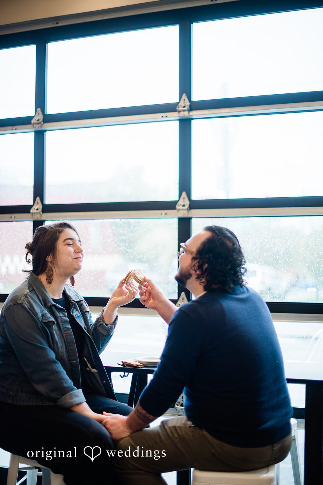 Couple sharing desserts during their engagement shoot at Mainstay Provisions