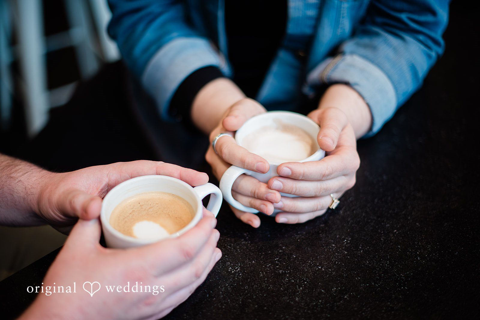Couple enjoying coffee together inside Mainstay Provisions