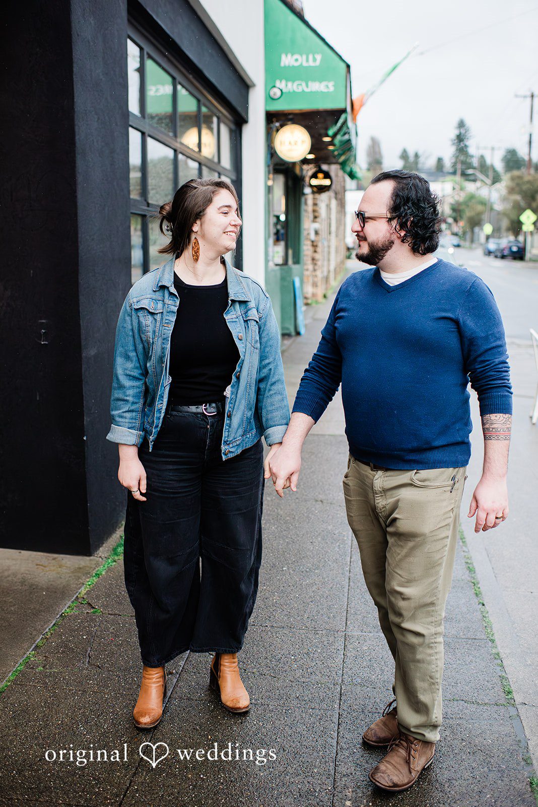 Couple holding hands at Mainstay Provisions captured by Seattle Engagement Photographers from Original Wedding