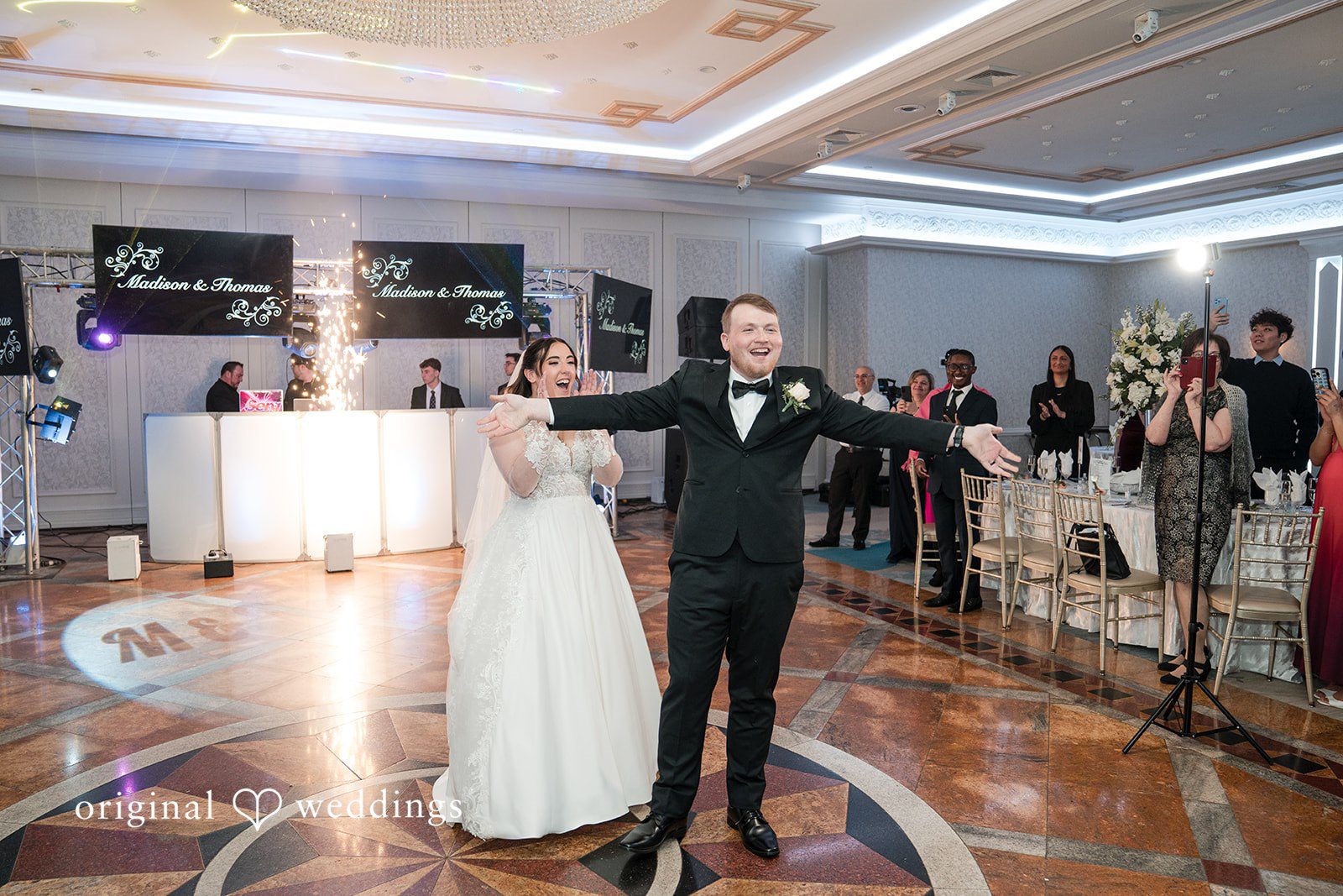 Couple expressing their joy after wedding ceremony