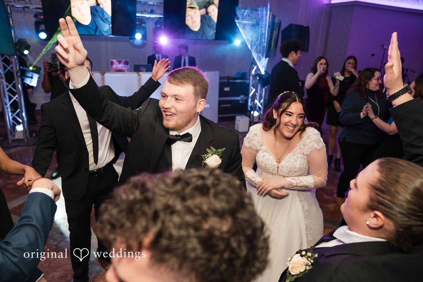 Couple expressing their joy with family