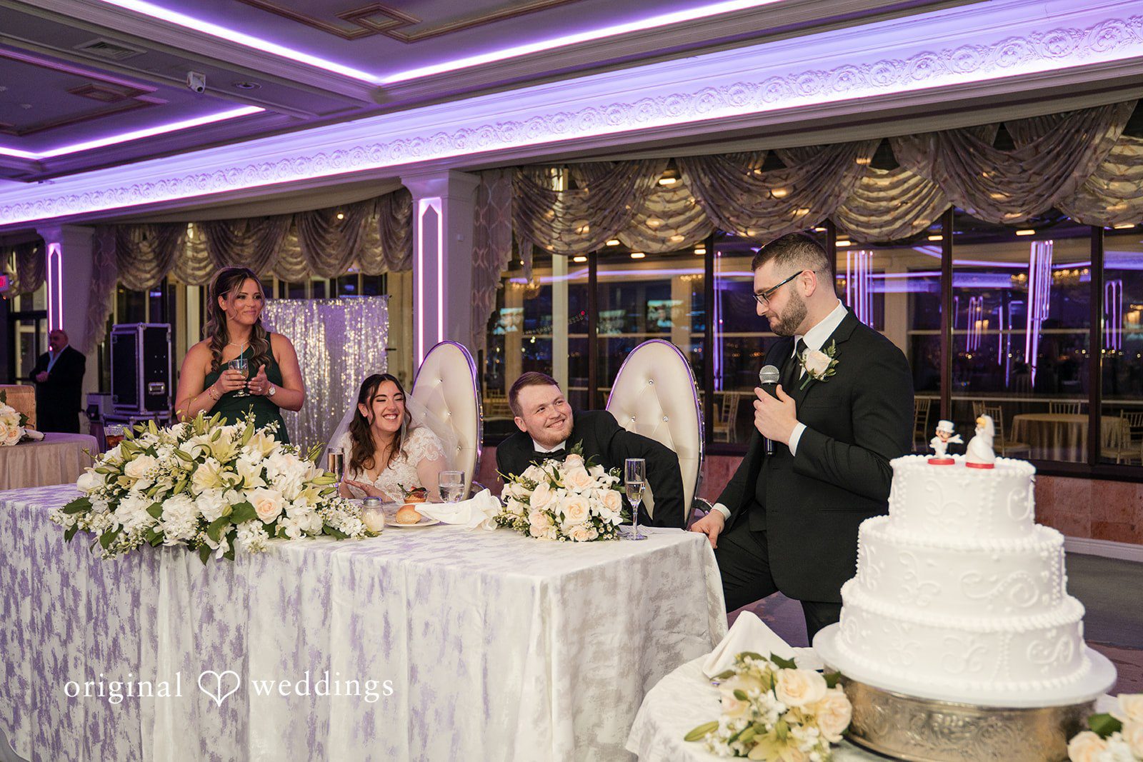 Couple celebrating their wedding with guests.