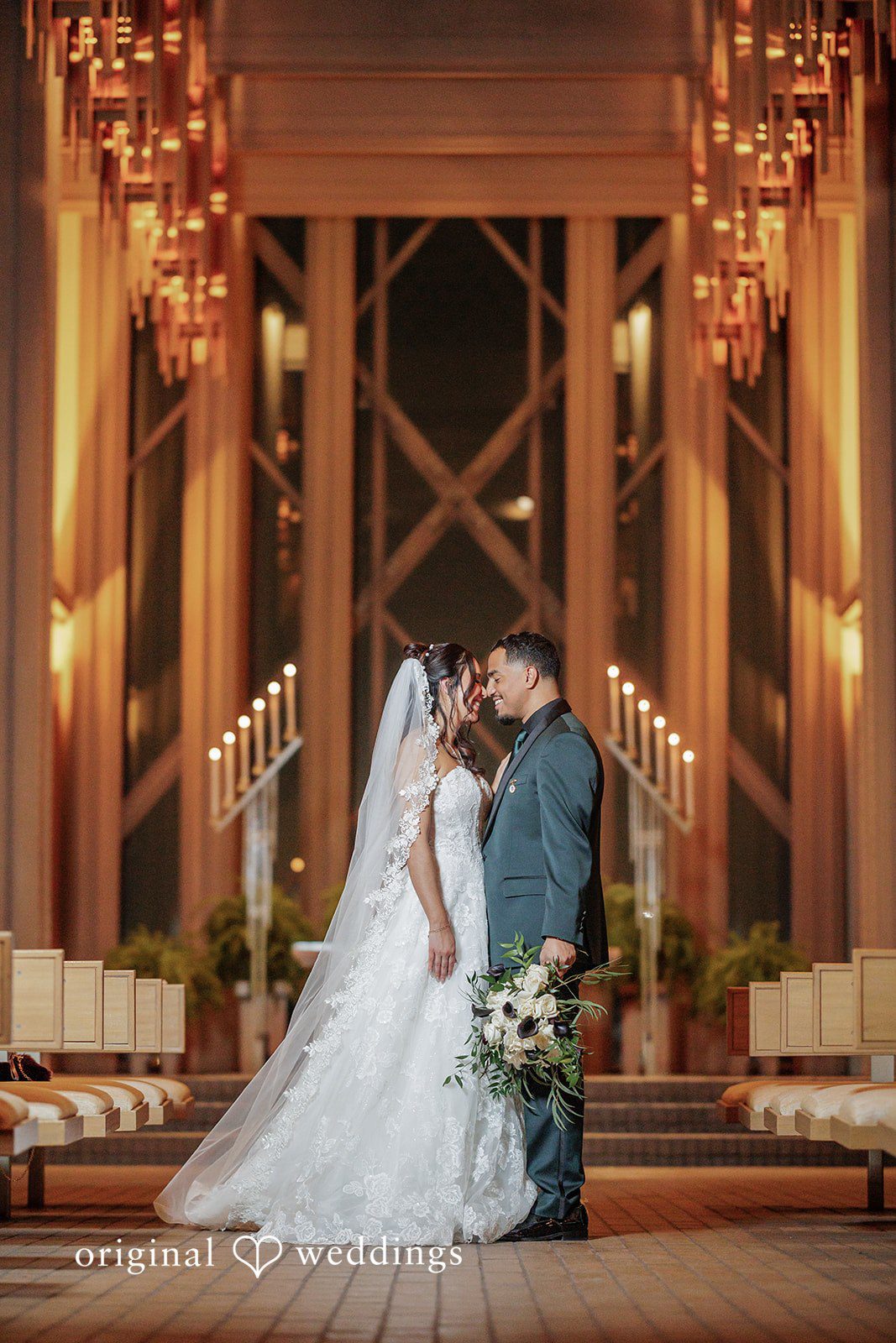 Cassandra + Benjamin A stunning portrait of the couple framed by the beauty of the chapel